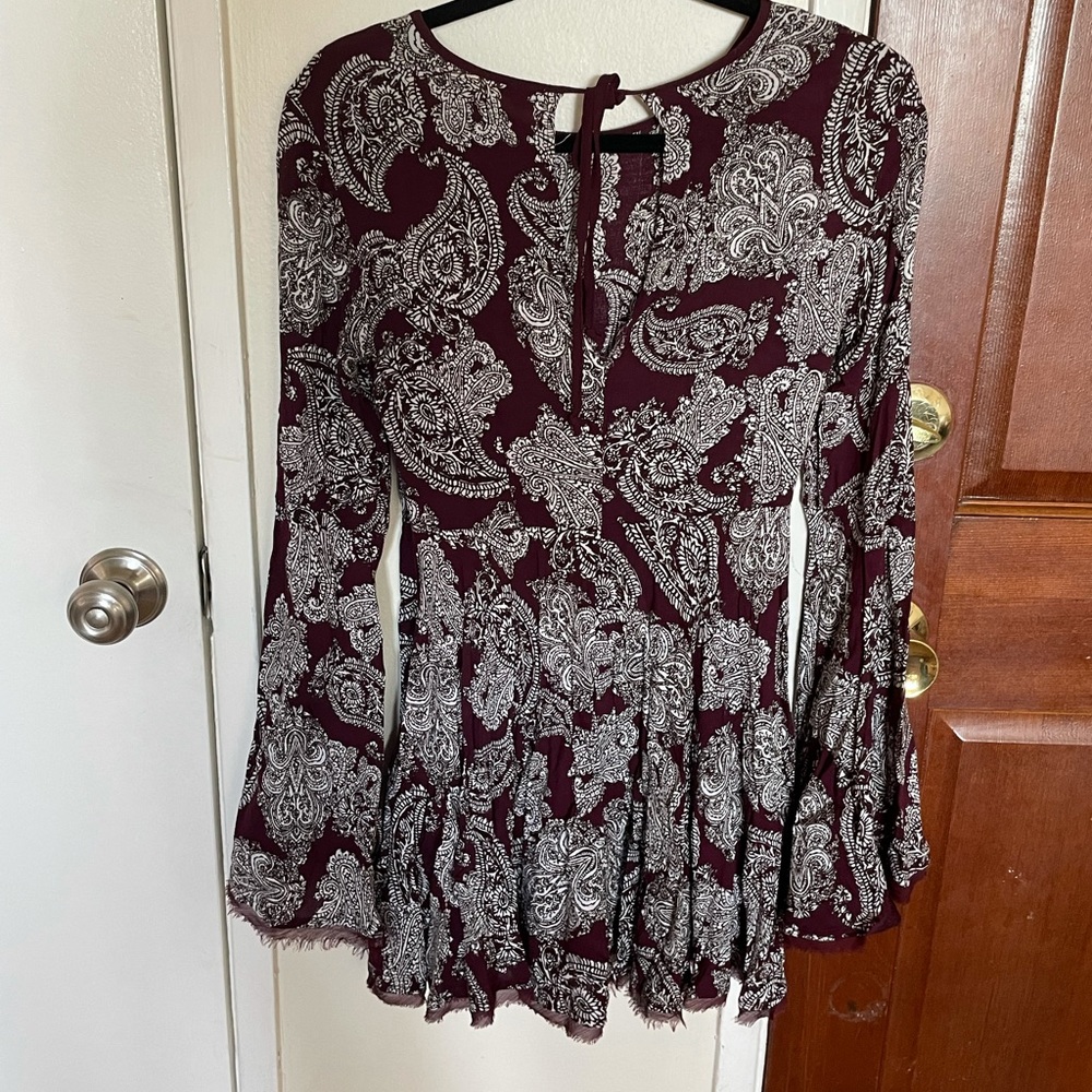 Flared dress with bell sleeves